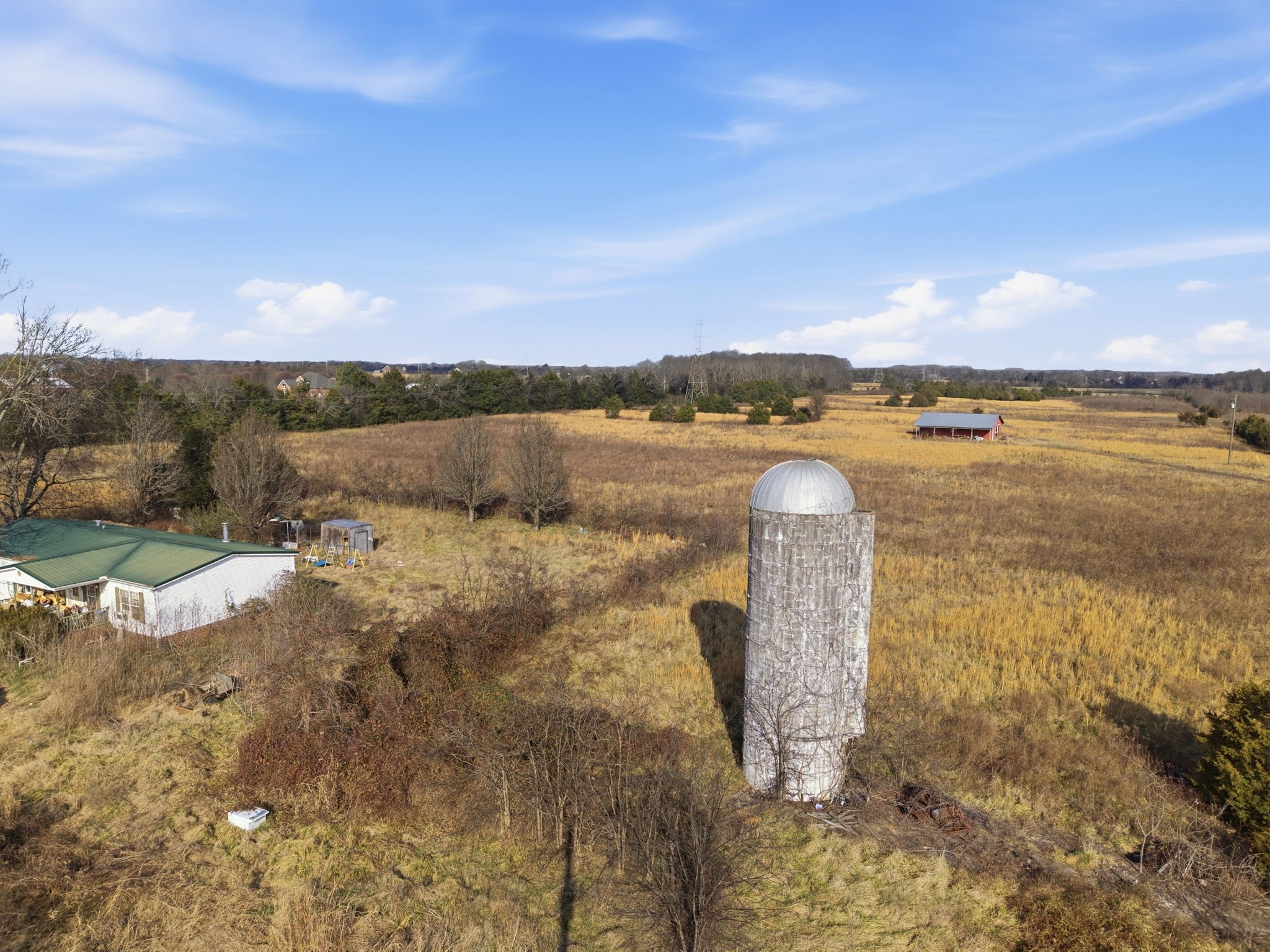 4689 Sledge Road Christiana, TN 37037 - Photo 5 of 32 a view of a lake with beach and city view
