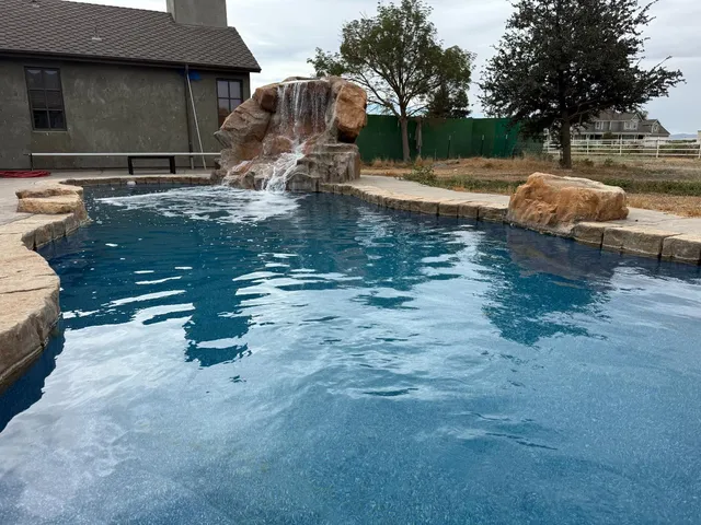 a view of a backyard with table and chairs