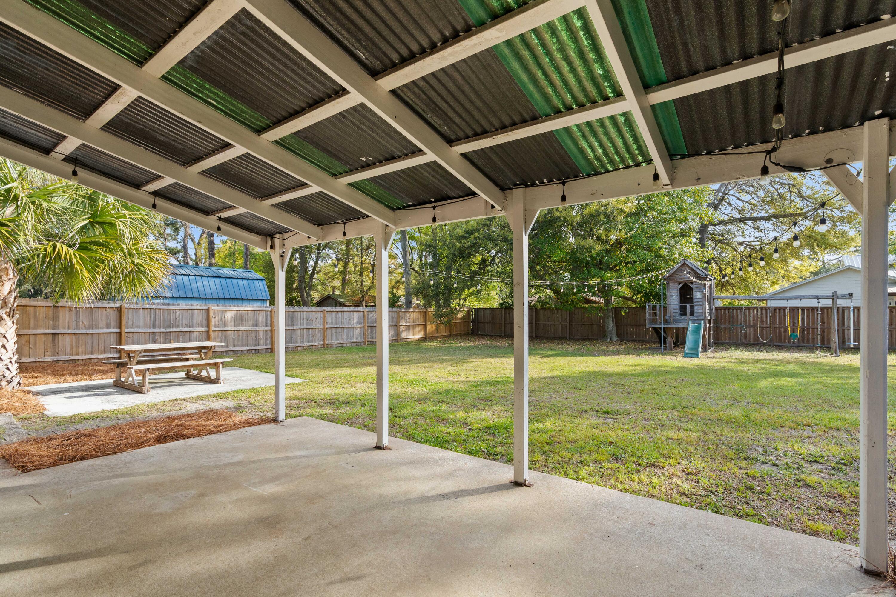 919 Tall Pine Road Mount Pleasant, SC 29464 - Photo 8 of 27 Covered patio