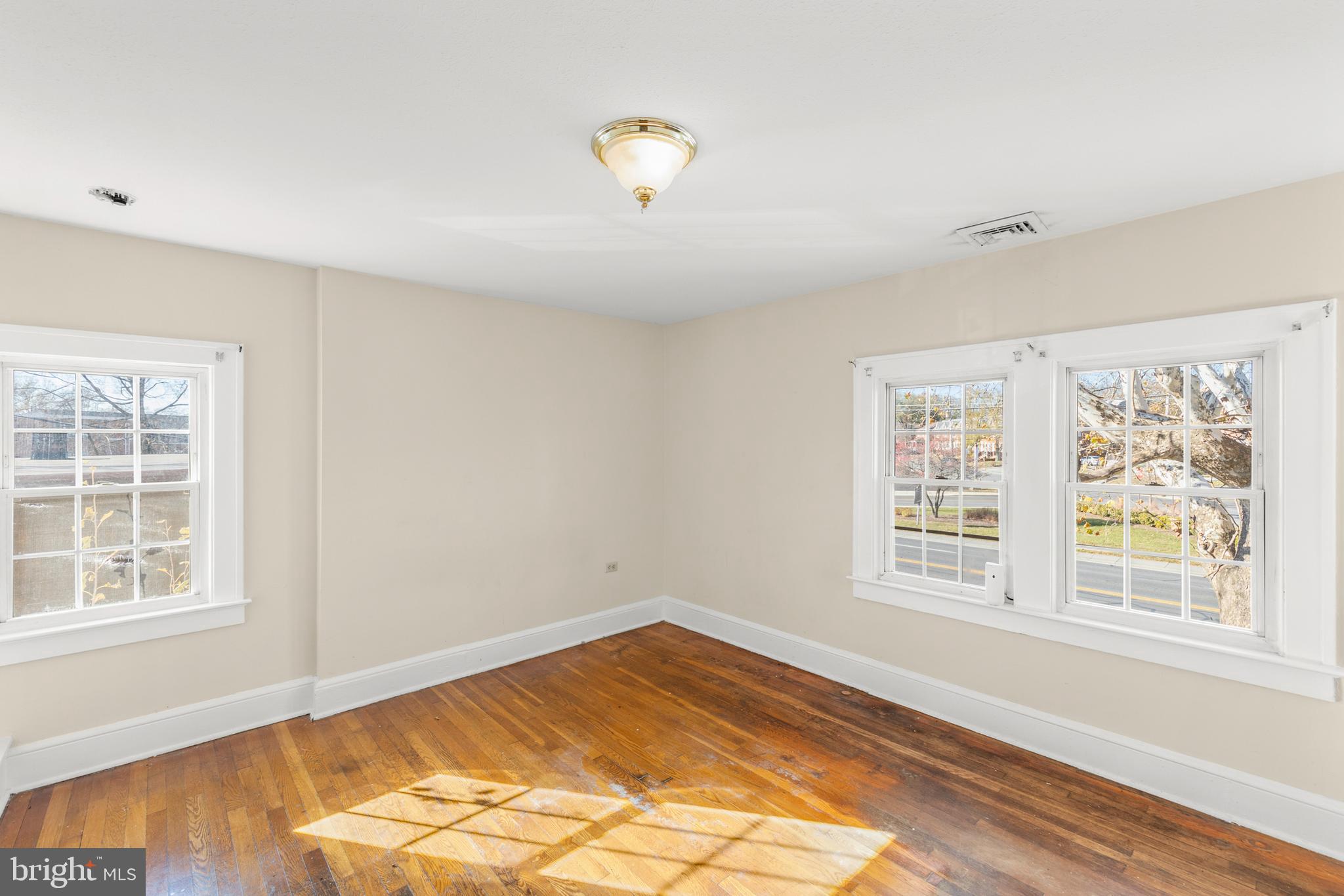675 Berryville Avenue Winchester, VA 22601 - Photo 22 of 32 a view of an empty room with a window