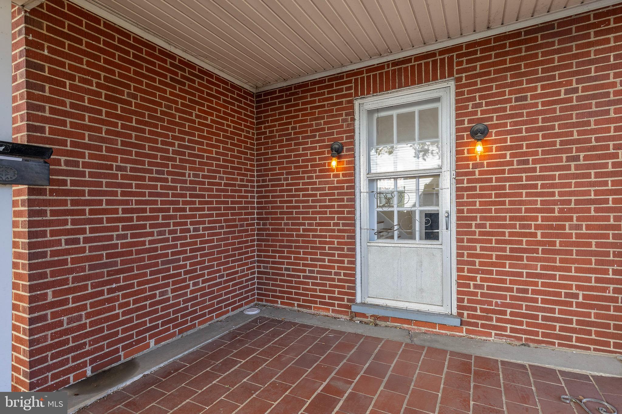 675 Berryville Avenue Winchester, VA 22601 - Photo 28 of 32 a view of an empty room with wooden floor