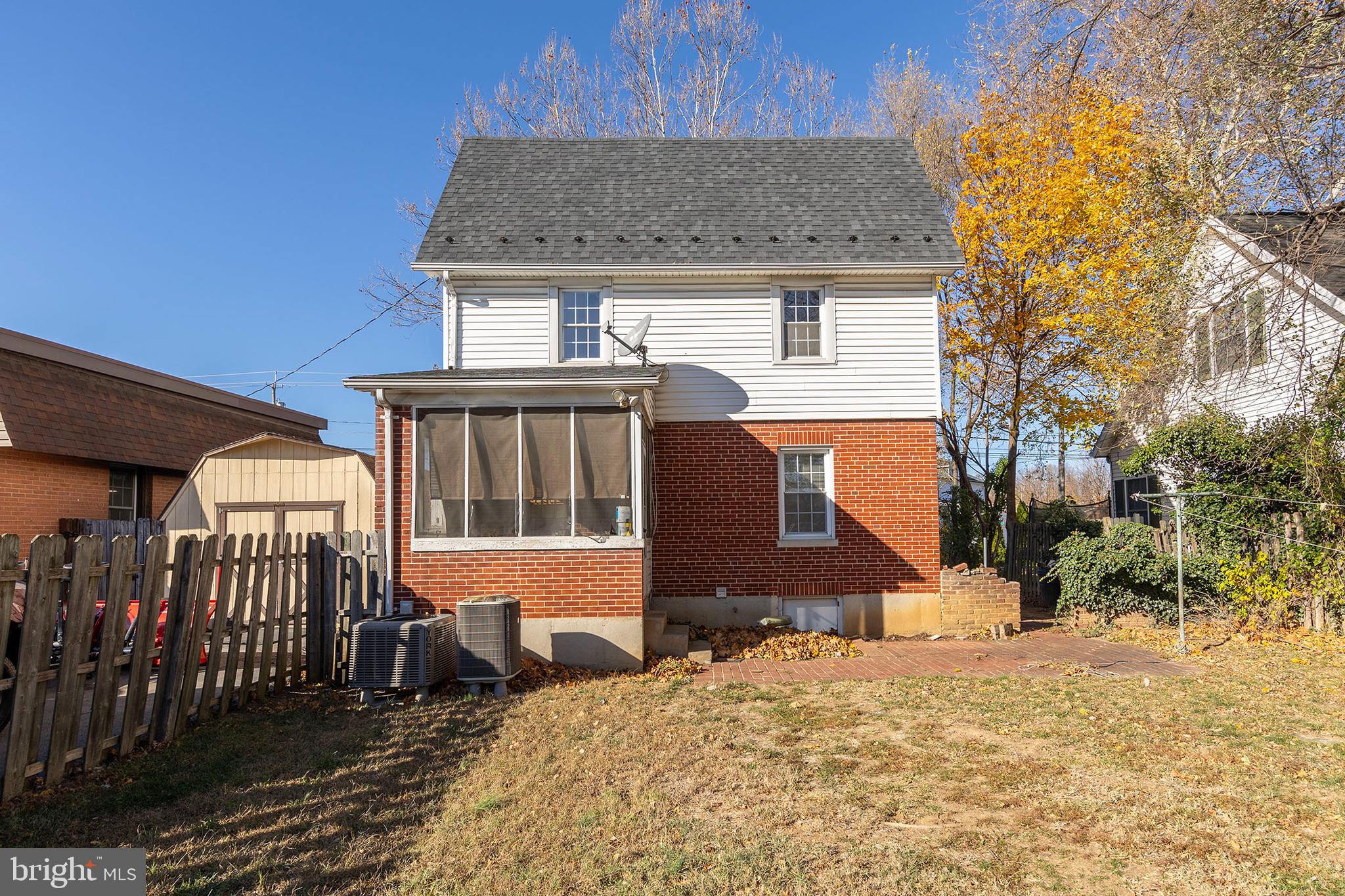 675 Berryville Avenue Winchester, VA 22601 - Photo 31 of 32 a front view of a house with a yard