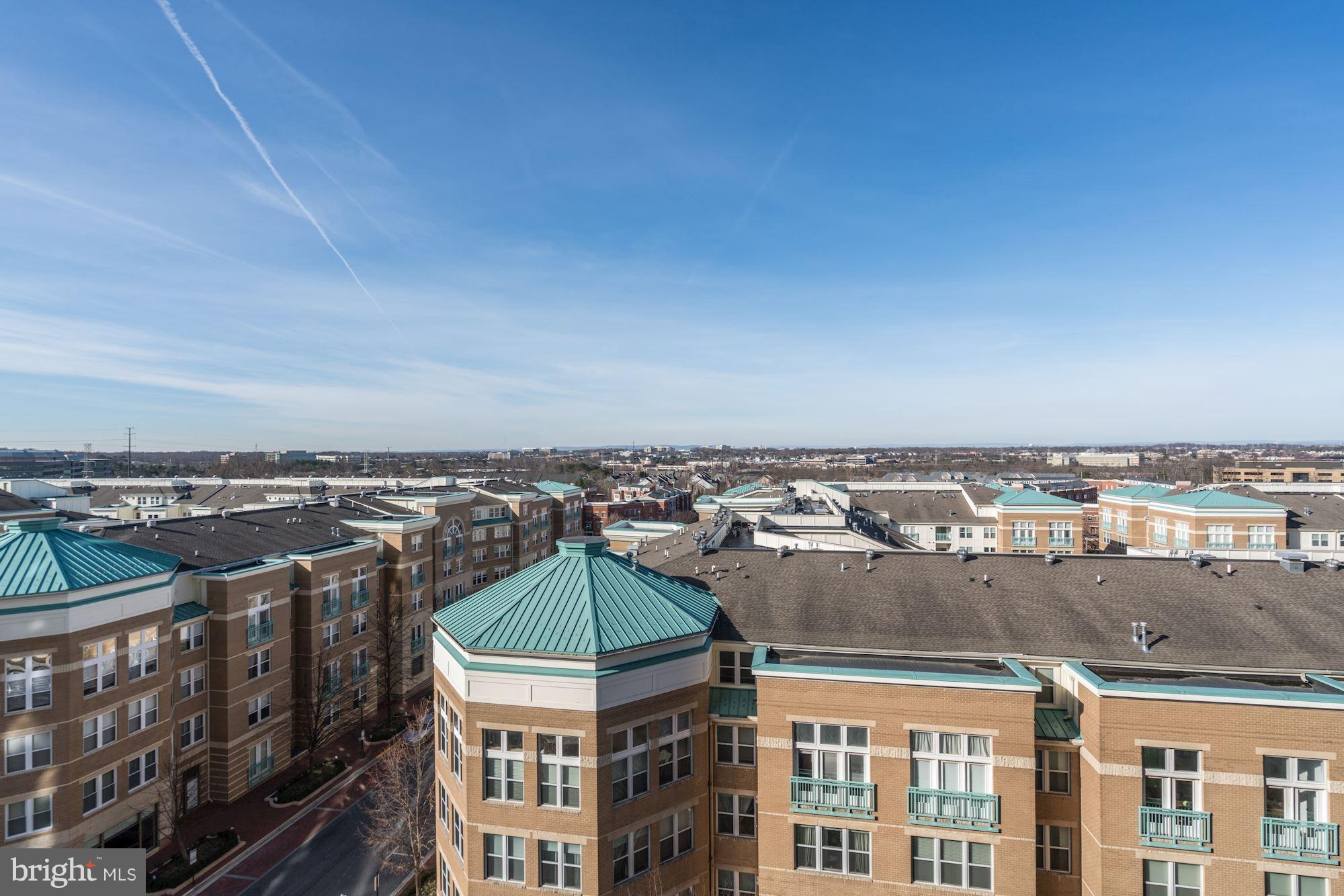 11990 Market Street, Unit 713 Reston, VA 20190 - Photo 24 of 30 a view of a city with tall buildings