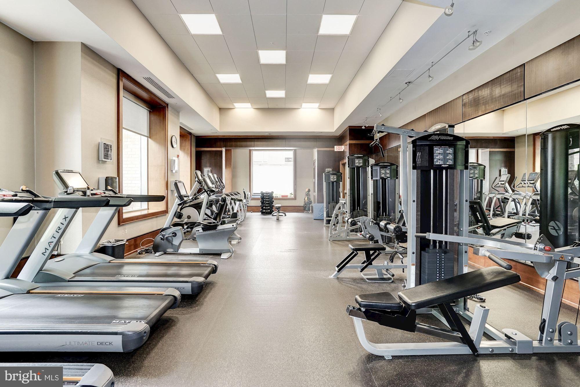 11990 Market Street, Unit 713 Reston, VA 20190 - Photo 25 of 30 a view of a room with gym equipment