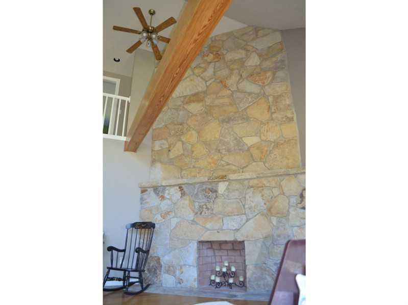 166 Harmons Beach Road Standish, ME 04084 - Photo 3 of 23 Living Room. Stone fireplace