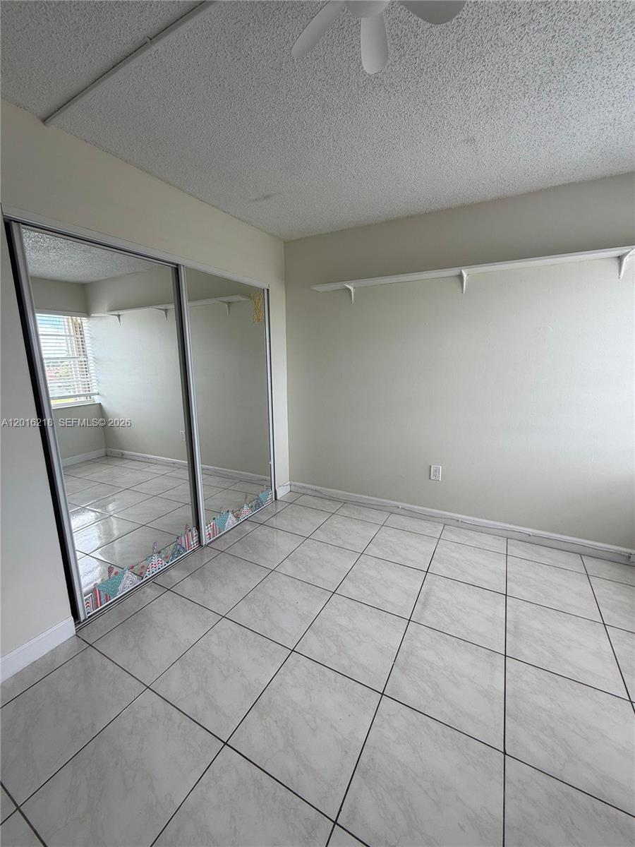 9321 Southwest 4th Street, Unit 230C Miami, FL 33174 - Photo 30 of 37 a view of an empty room