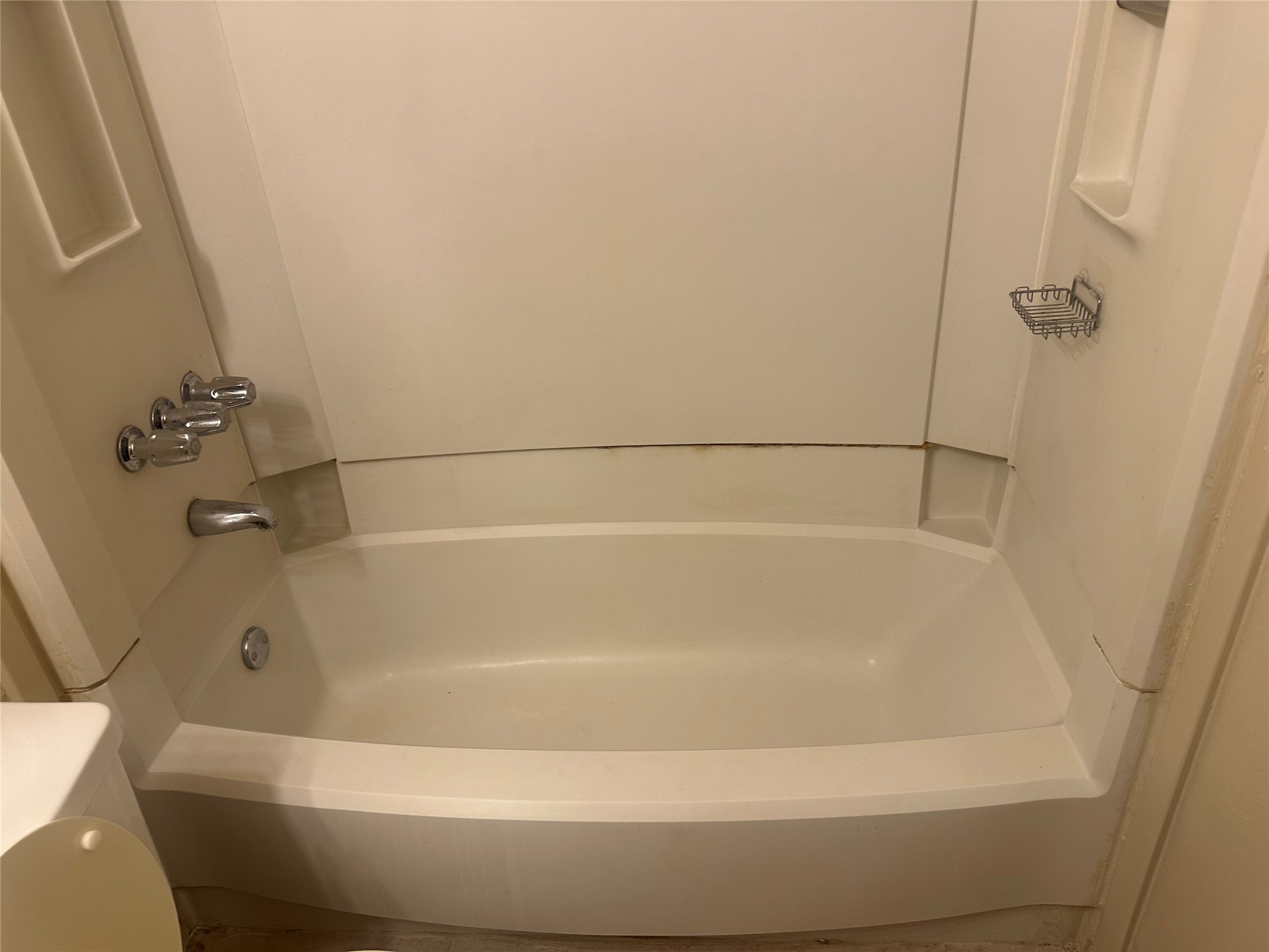 2602 South Bagdad Road, Unit A Leander, TX 78641 - Photo 12 of 26 A deep soaking tub awaits in this functional bathroom setup.