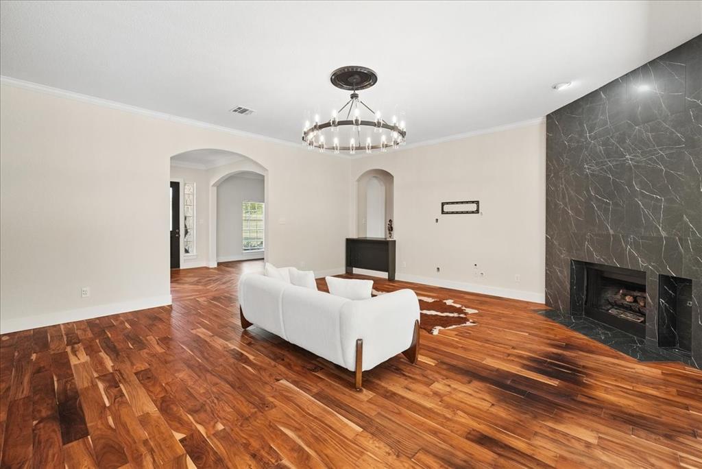 101 Deer Crossing Way Azle, TX 76020 - Photo 12 of 40 a living room with furniture and a fireplace