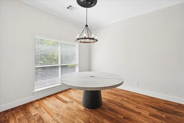a kitchen with stainless steel appliances a sink dishwasher stove and refrigerator
