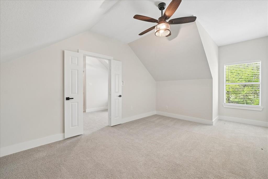 101 Deer Crossing Way Azle, TX 76020 - Photo 29 of 40 an empty room with windows and fan