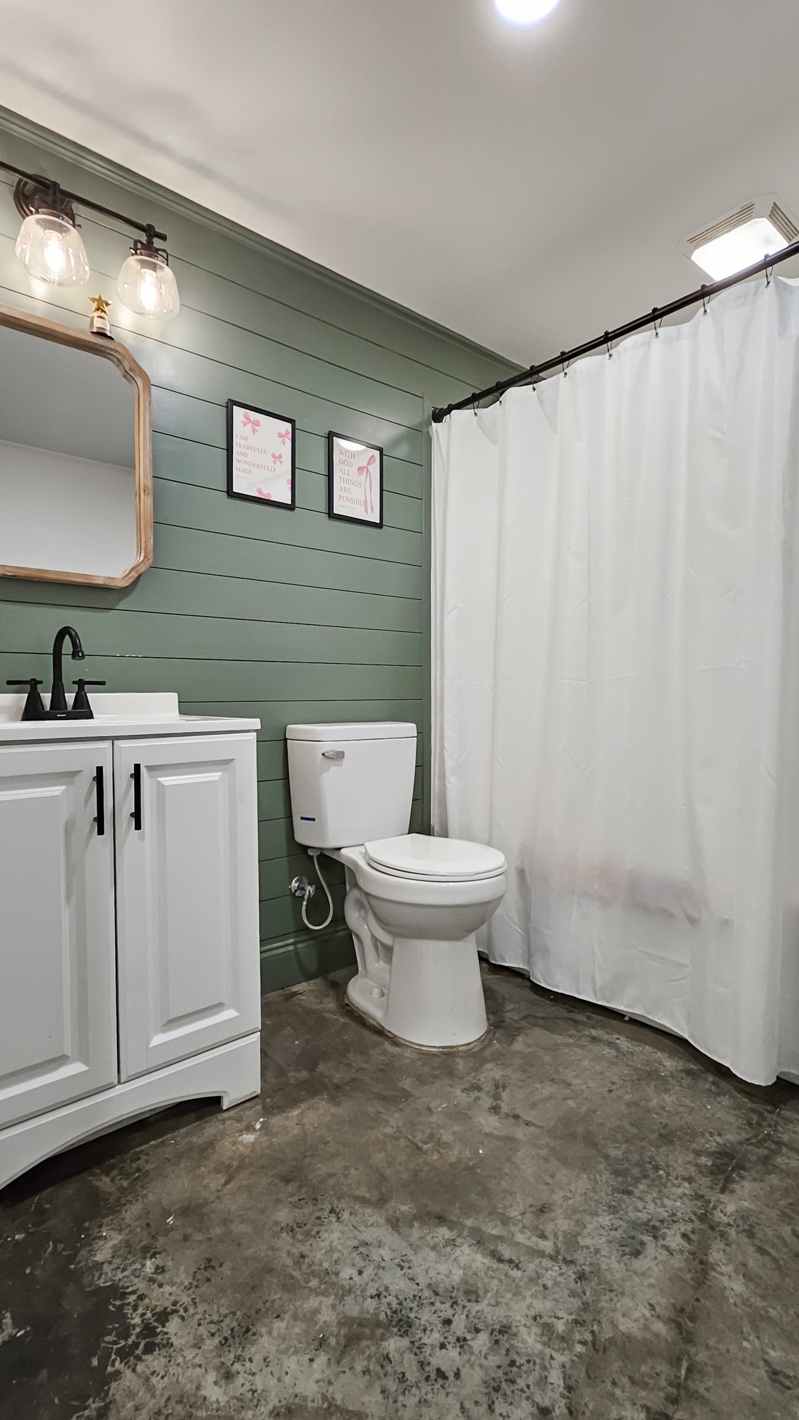 25872 Union Hill Road Ardmore, TN 38449 - Photo 15 of 28 a bathroom with a sink a toilet and mirror