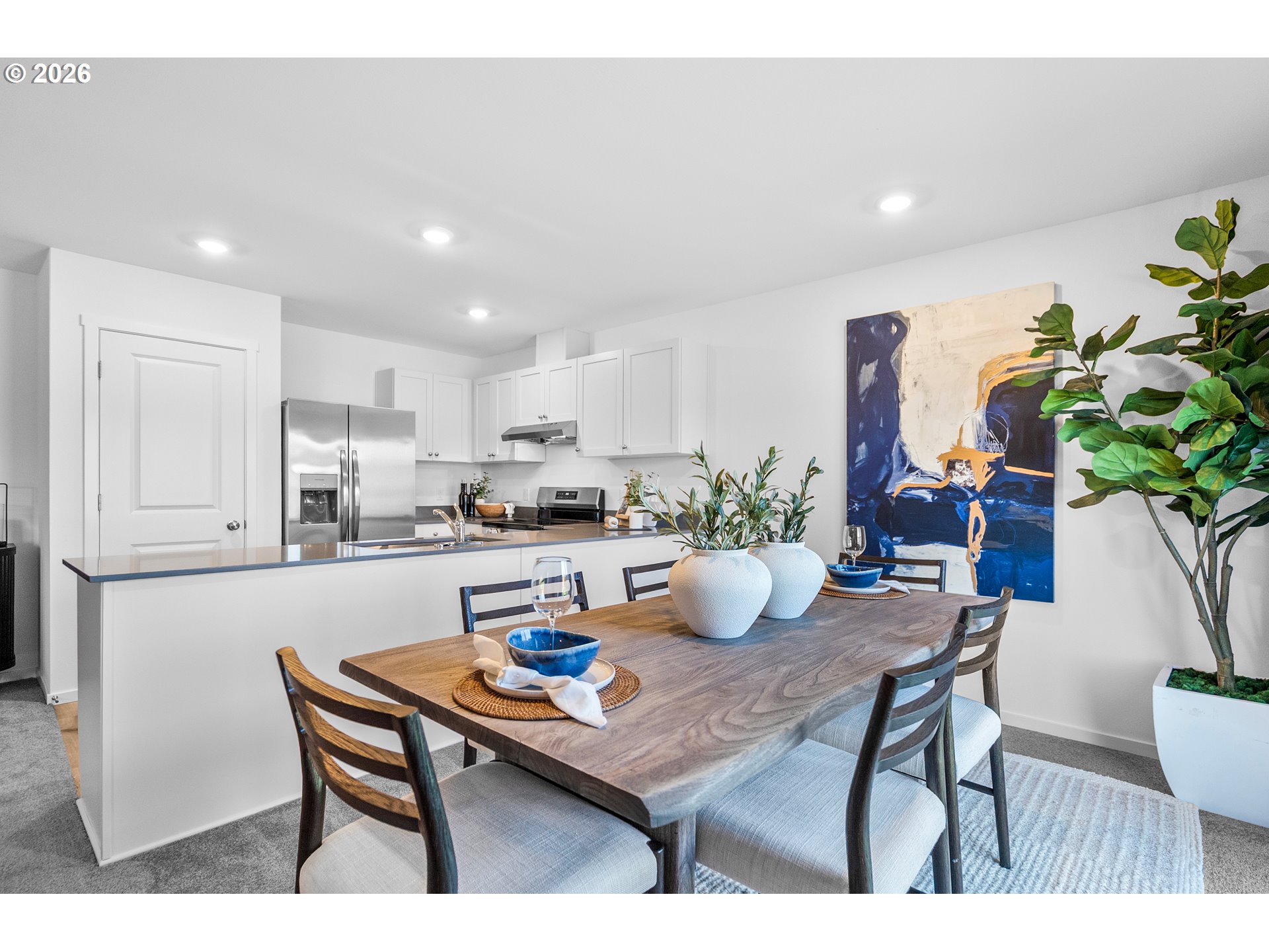 25263 Tanglewood Way Veneta, OR 97487 - Photo 18 of 28 a kitchen with a table and chairs in it