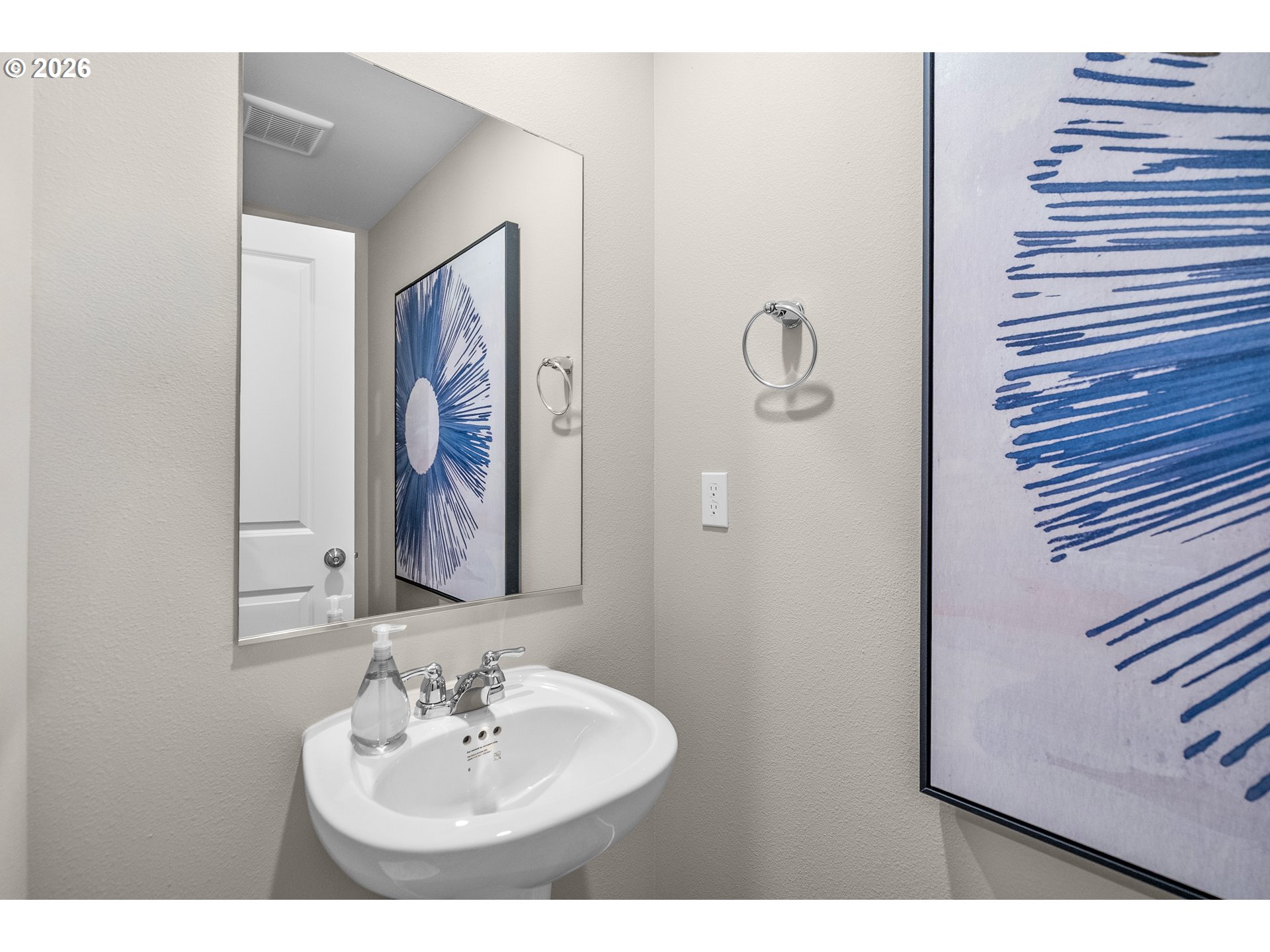 25263 Tanglewood Way Veneta, OR 97487 - Photo 4 of 28 a bathroom with a sink and mirror