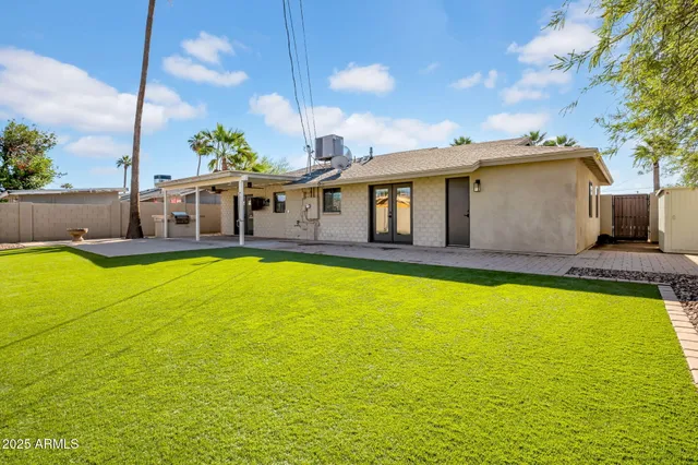 a view of a house with swimming pool