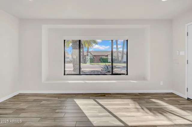 a view of a room that has a window