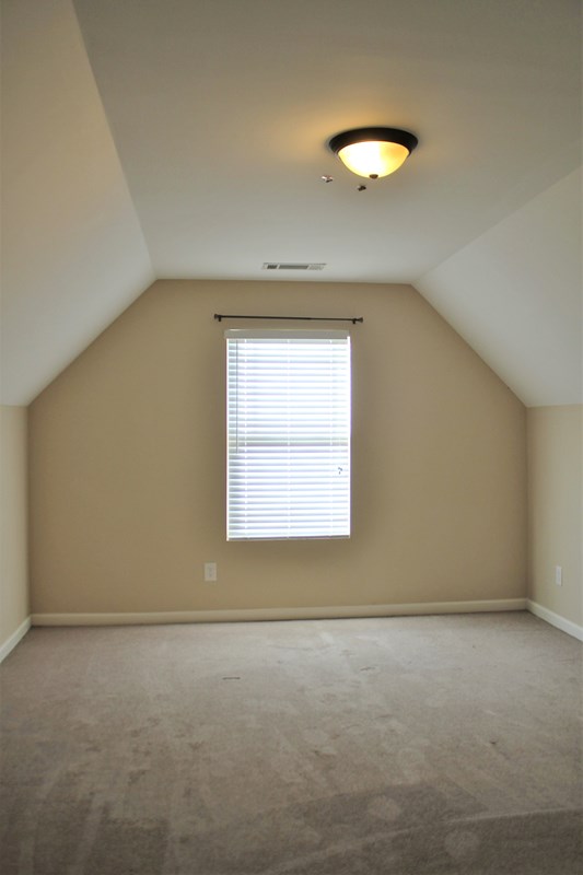 2141 Lee Road Phenix City, AL 36870 - Photo 21 of 24 an empty room with a window