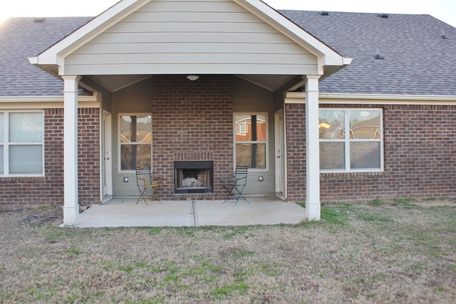 2141 Lee Road Phenix City, AL 36870 - Photo 24 of 24 a front view of a house with a yard