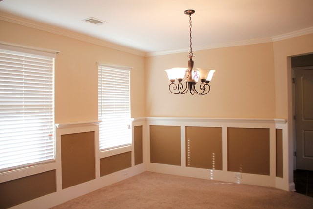 2141 Lee Road Phenix City, AL 36870 - Photo 4 of 24 a view of a room with window wooden floor and a chandelier