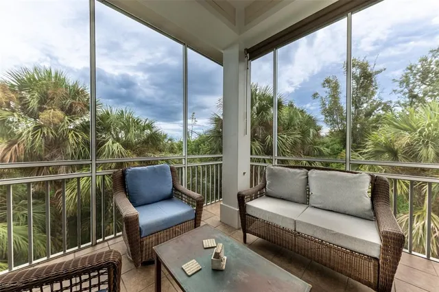 a spacious bathroom with a tub and a large window