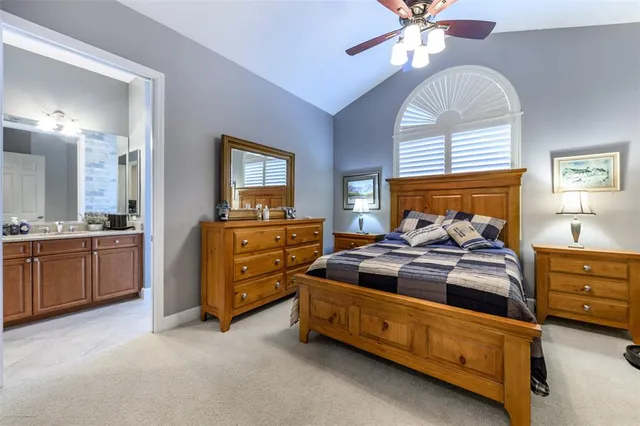 a view of a swimming pool with a patio and a yard