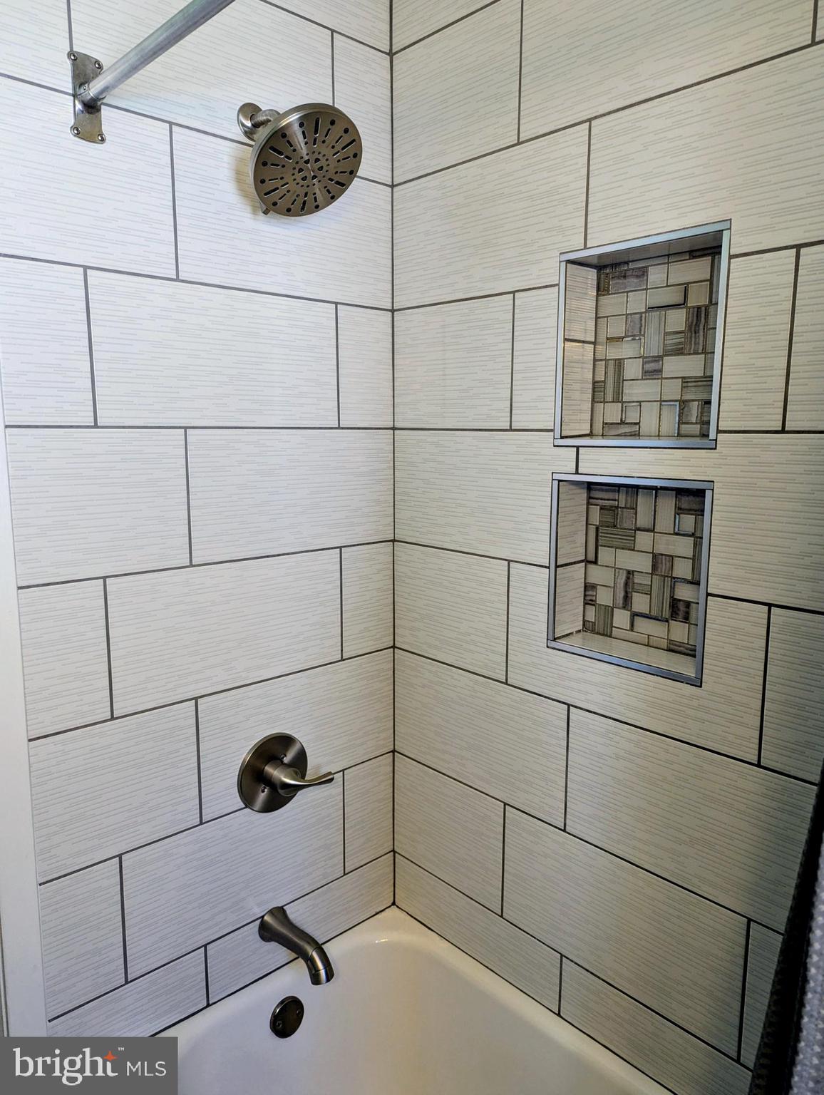 4917 Shepherd Street Brookhaven, PA 19015 - Photo 18 of 34 a bathroom with a shower