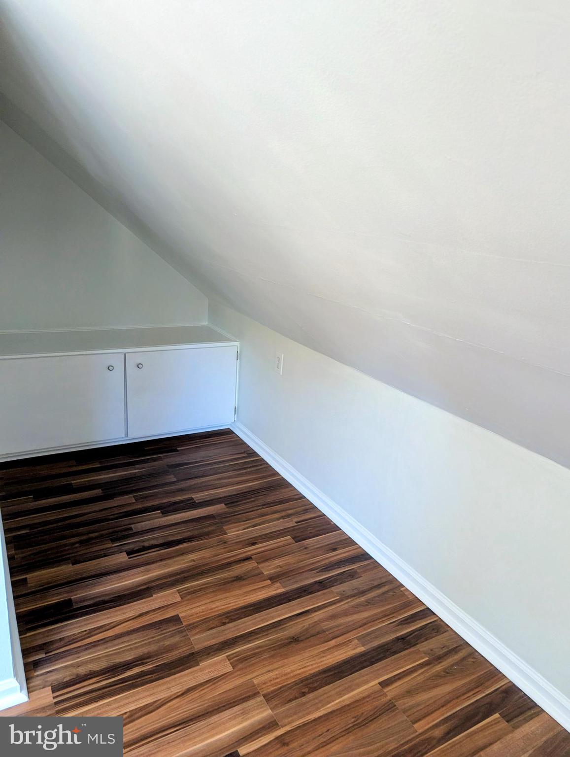 4917 Shepherd Street Brookhaven, PA 19015 - Photo 27 of 34 a view of a hallway with wooden floor