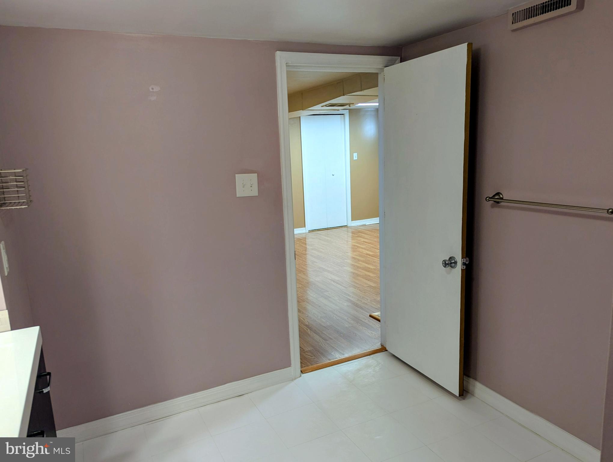 4917 Shepherd Street Brookhaven, PA 19015 - Photo 29 of 34 an empty room with mirror