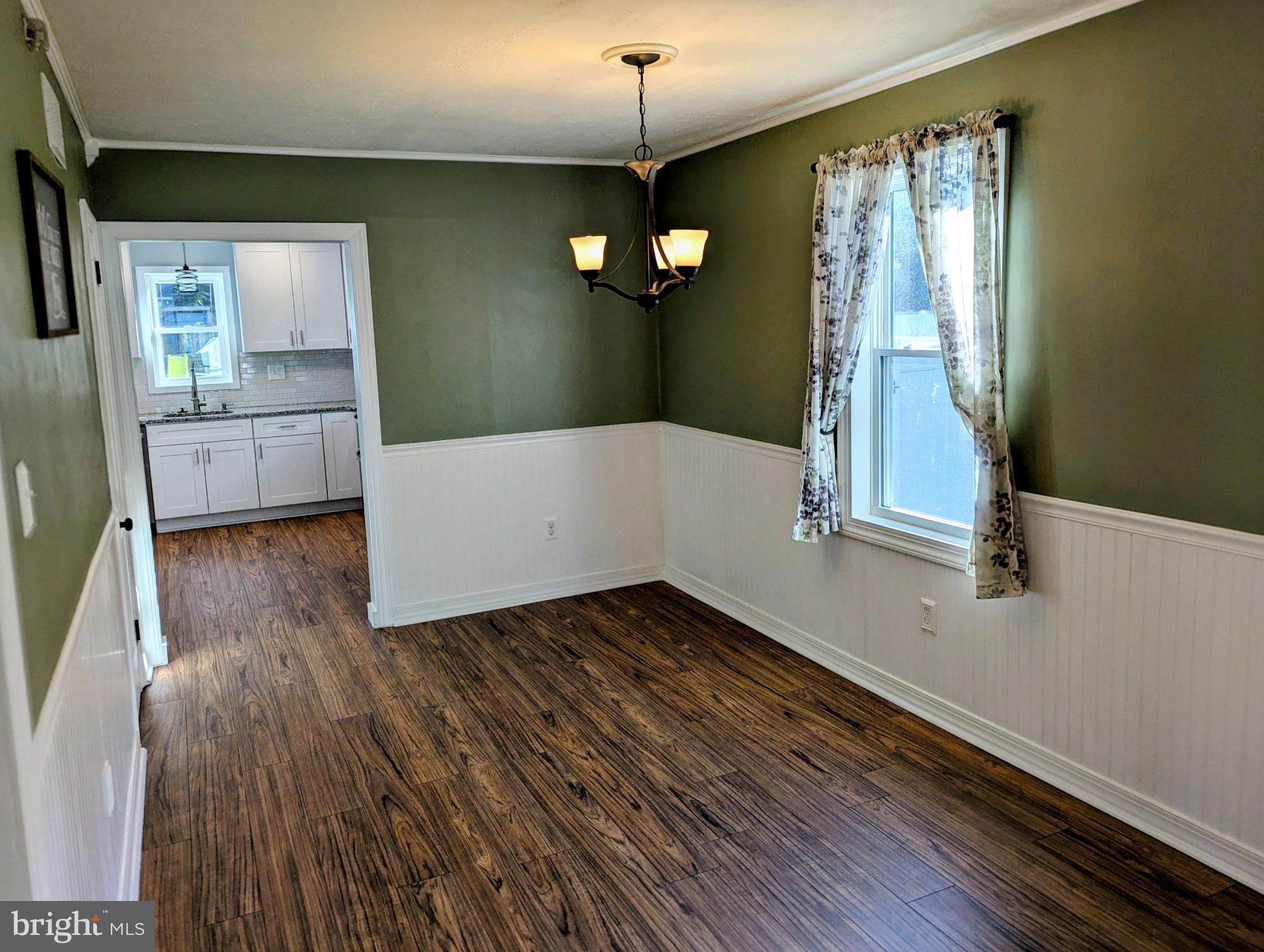 4917 Shepherd Street Brookhaven, PA 19015 - Photo 4 of 34 a very nice looking room with wooden floor