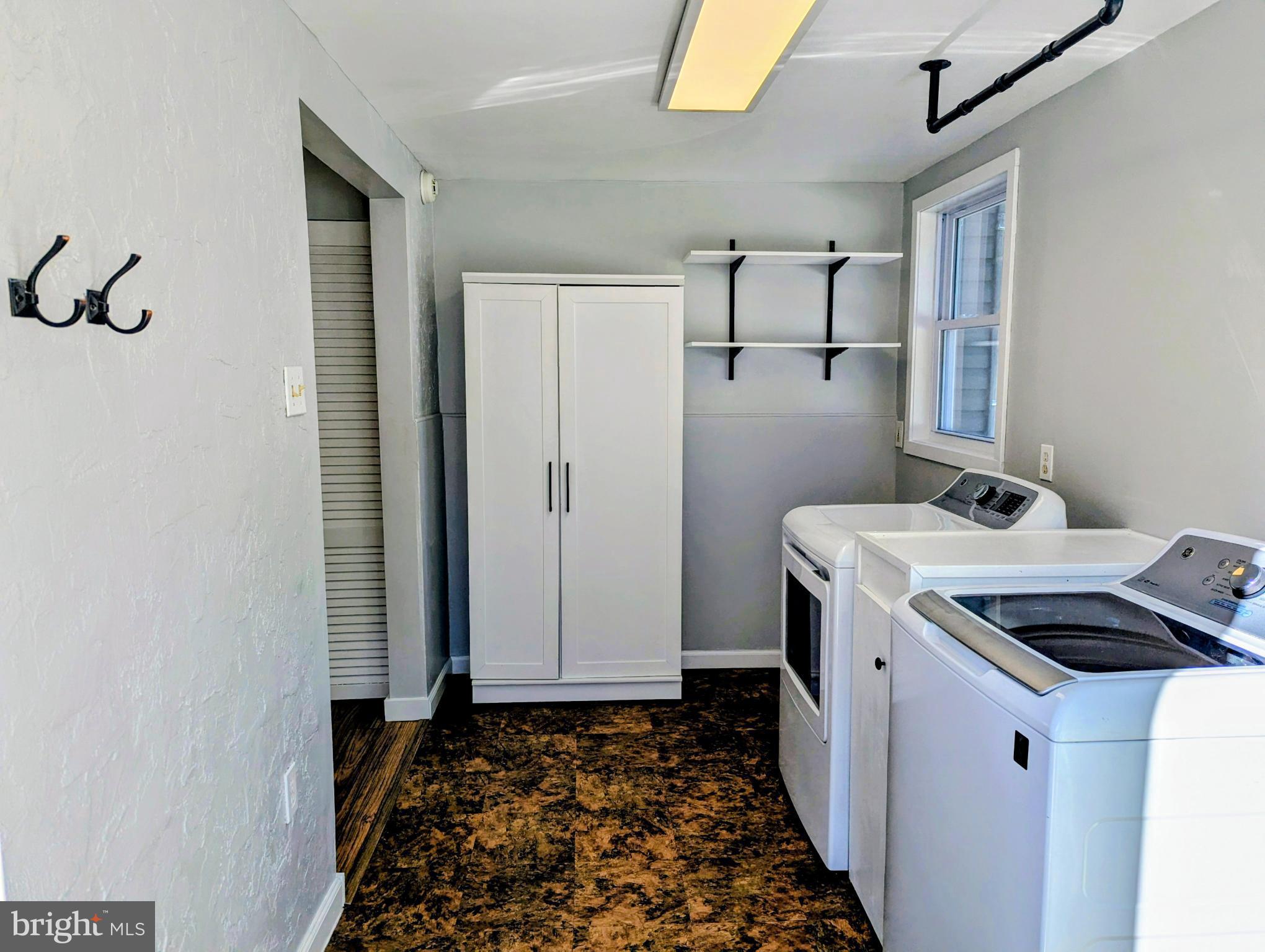 4917 Shepherd Street Brookhaven, PA 19015 - Photo 5 of 34 a bathroom with a granite countertop sink and a mirror