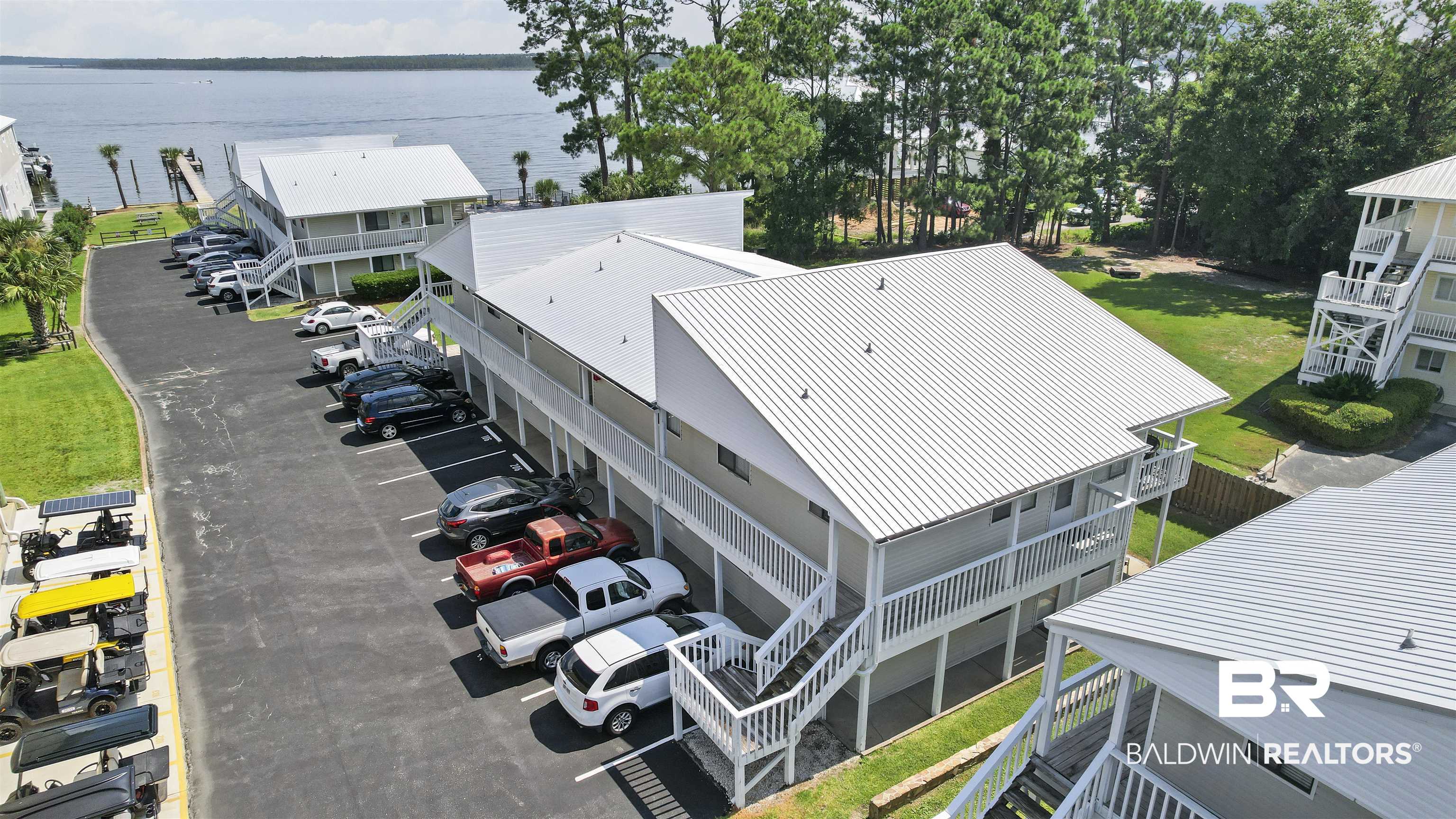 25925 Canal Road, Unit 207 Orange Beach, AL 36561 - Photo 9 of 42 Aerial view featuring a water view