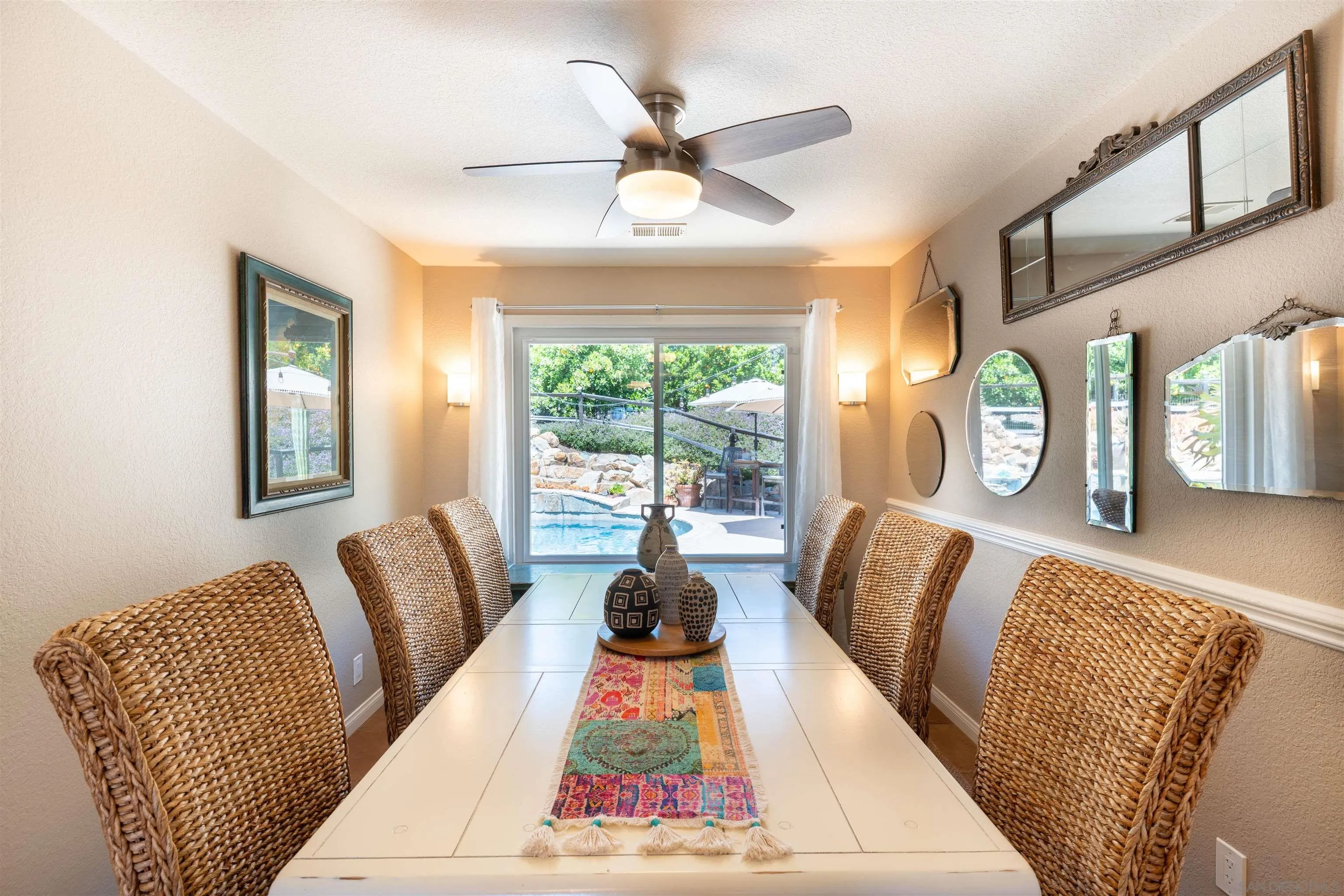 1045 Capra Way Fallbrook, CA 92028 - Photo 12 of 44 a living room with furniture and a large window