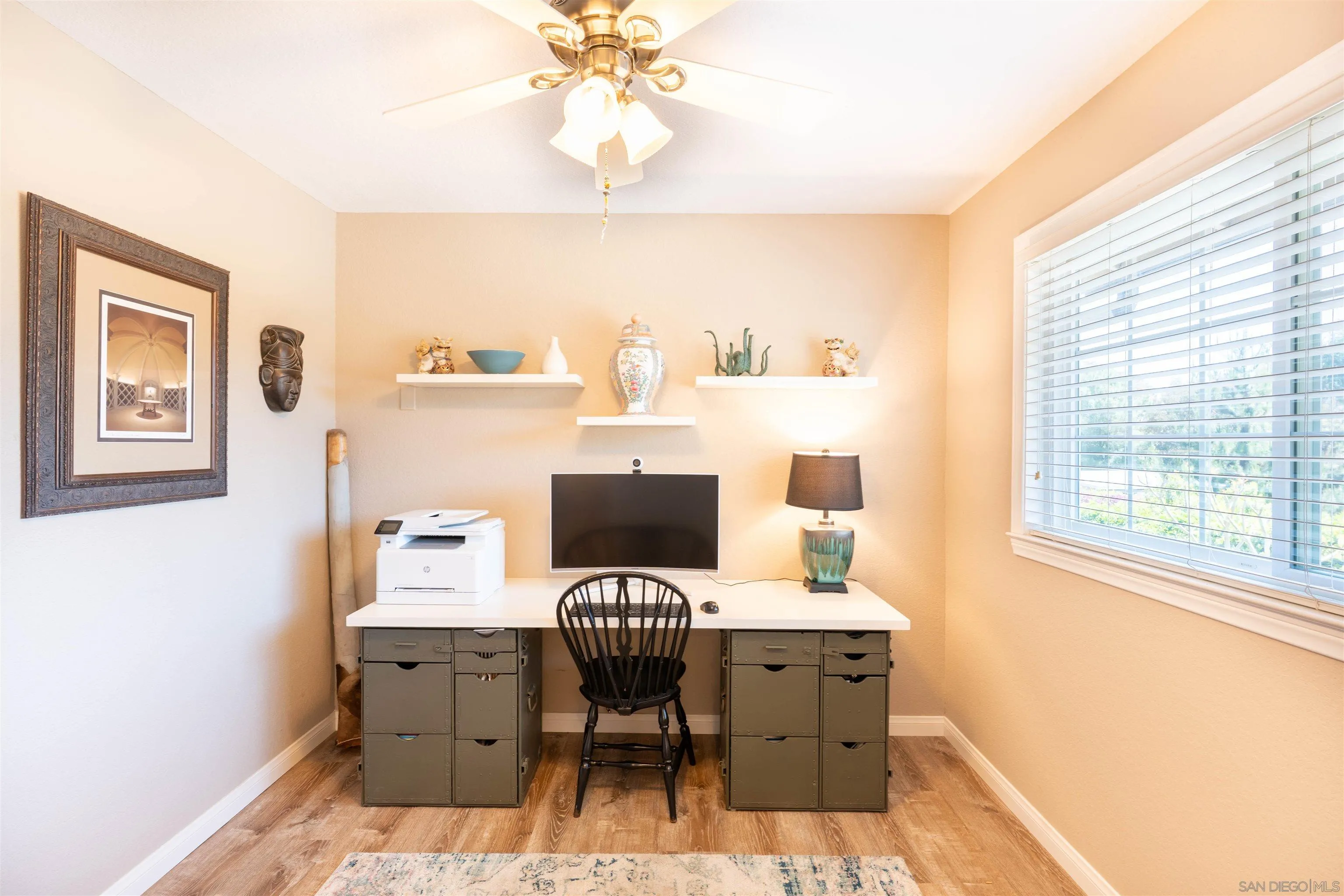 1045 Capra Way Fallbrook, CA 92028 - Photo 22 of 44 a view of a workspace with furniture and a window