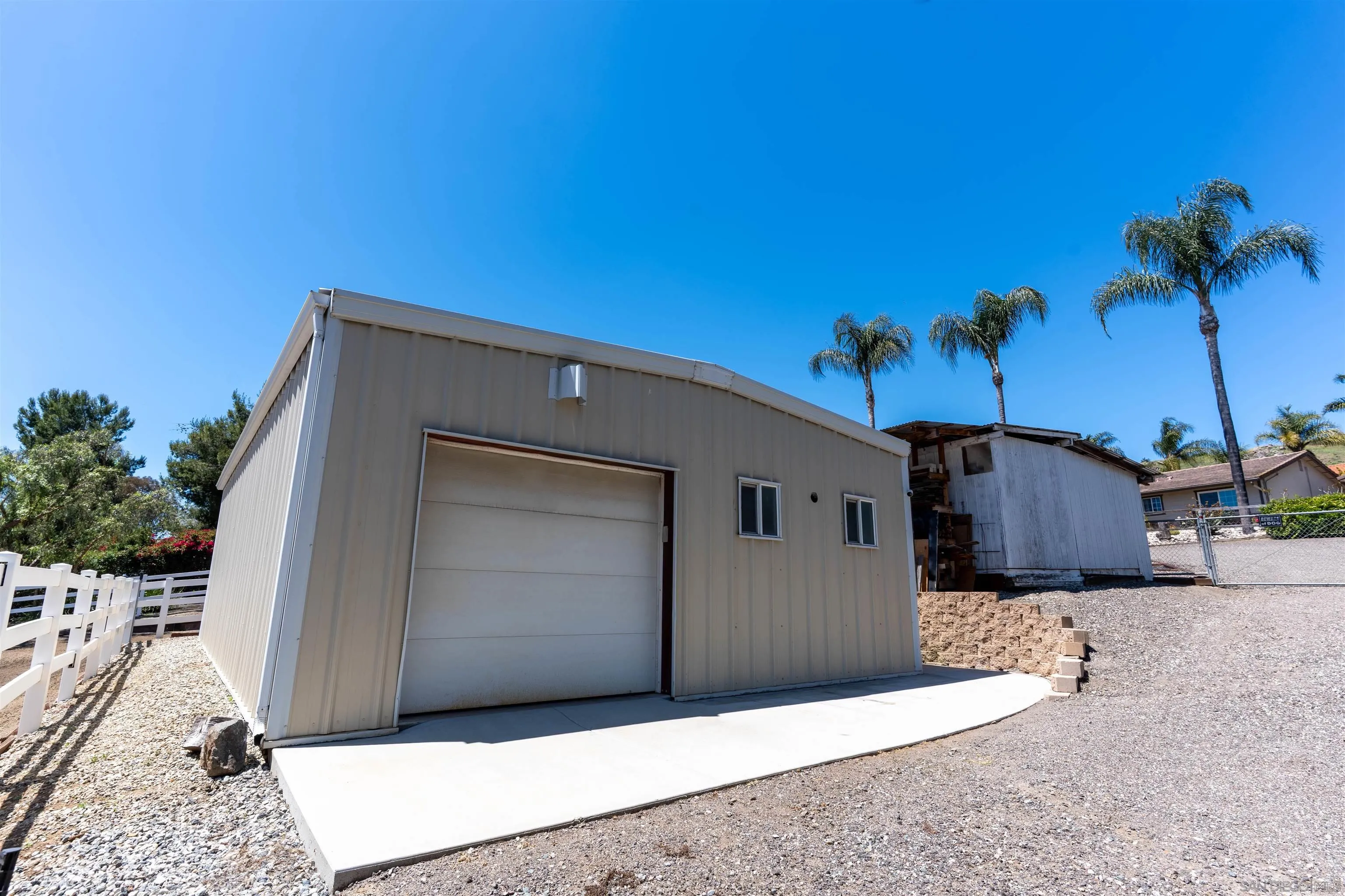1045 Capra Way Fallbrook, CA 92028 - Photo 40 of 44 a front view of a house with a yard
