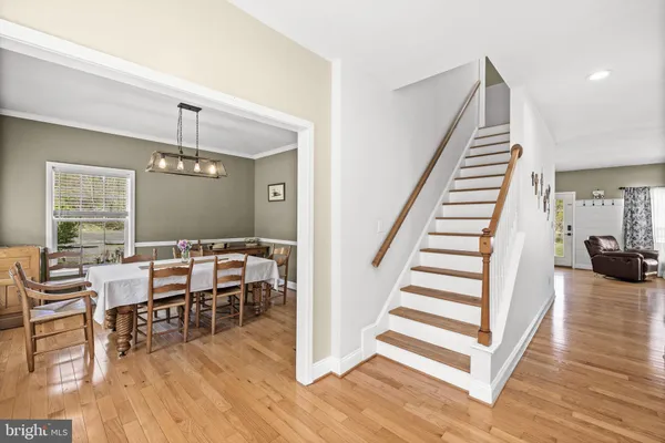a view of a livingroom with furniture and wooden floor