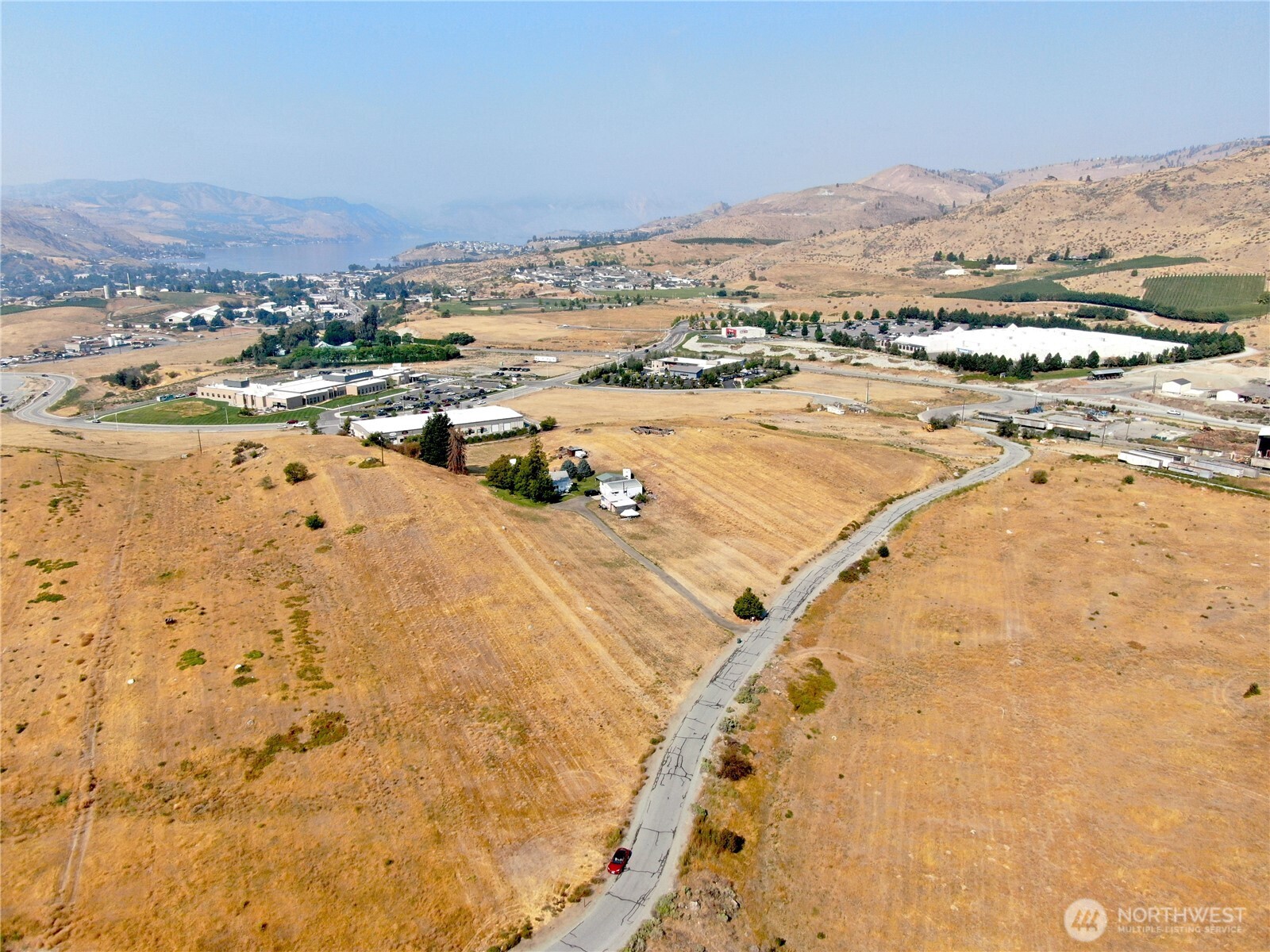 30 Isenhart Road Chelan, WA 98816 - Photo 2 of 10 an aerial view of residential houses with outdoor space