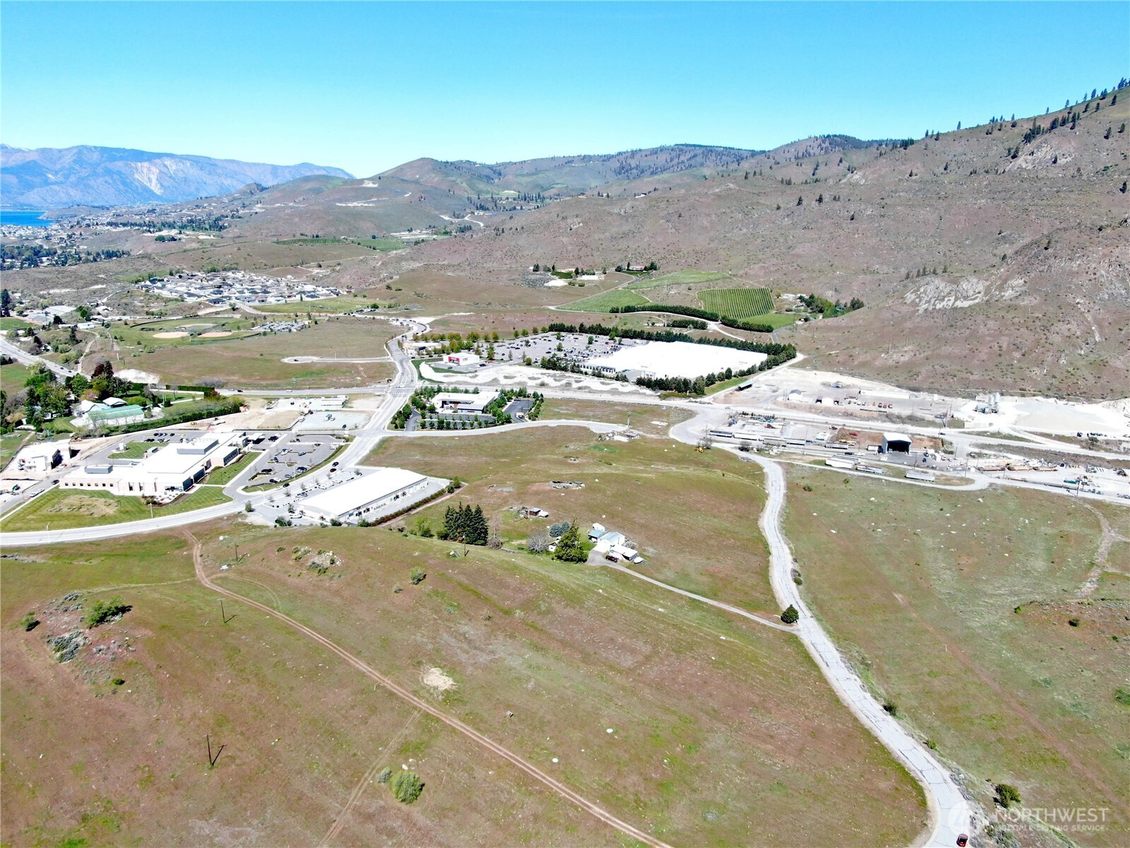 30 Isenhart Road Chelan, WA 98816 - Photo 9 of 11 a view of a lake with mountains in the background