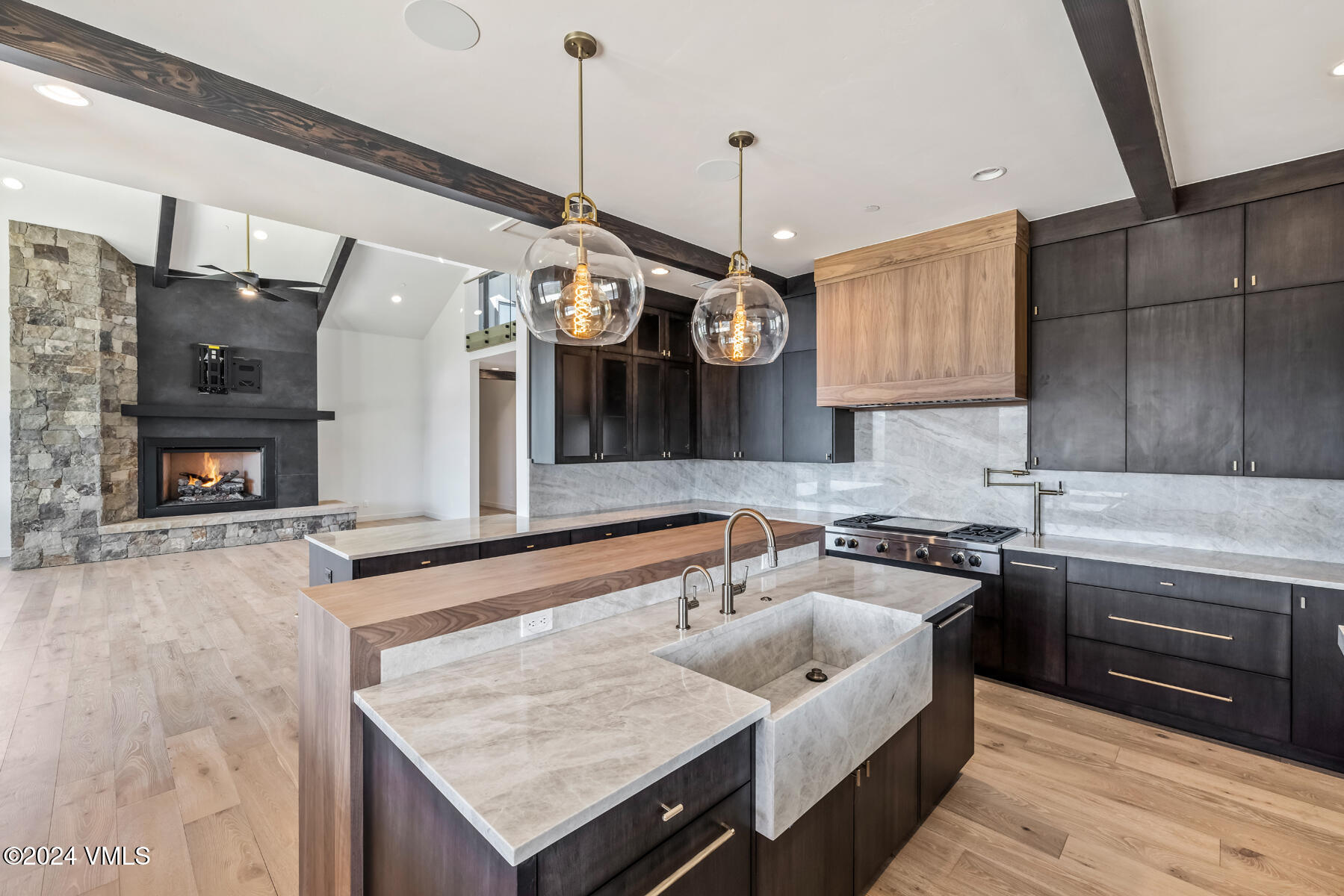 966 Webb Peak Edwards, CO 81632 - Photo 18 of 70 a large kitchen with stainless steel appliances granite countertop a stove and a sink
