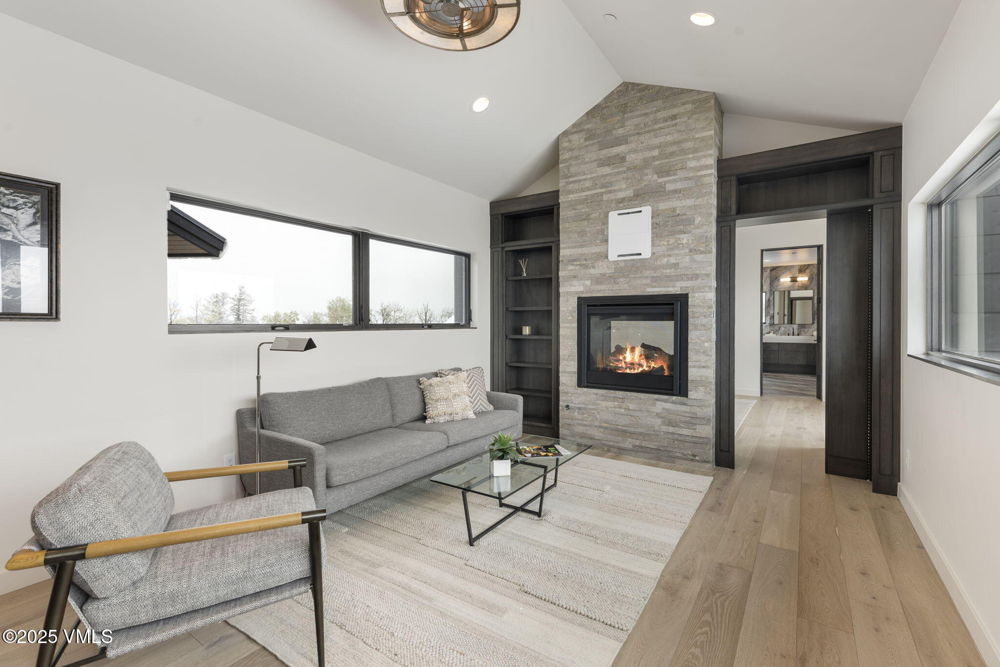 966 Webb Peak Edwards, CO 81632 - Photo 40 of 70 a living room with furniture and a fireplace