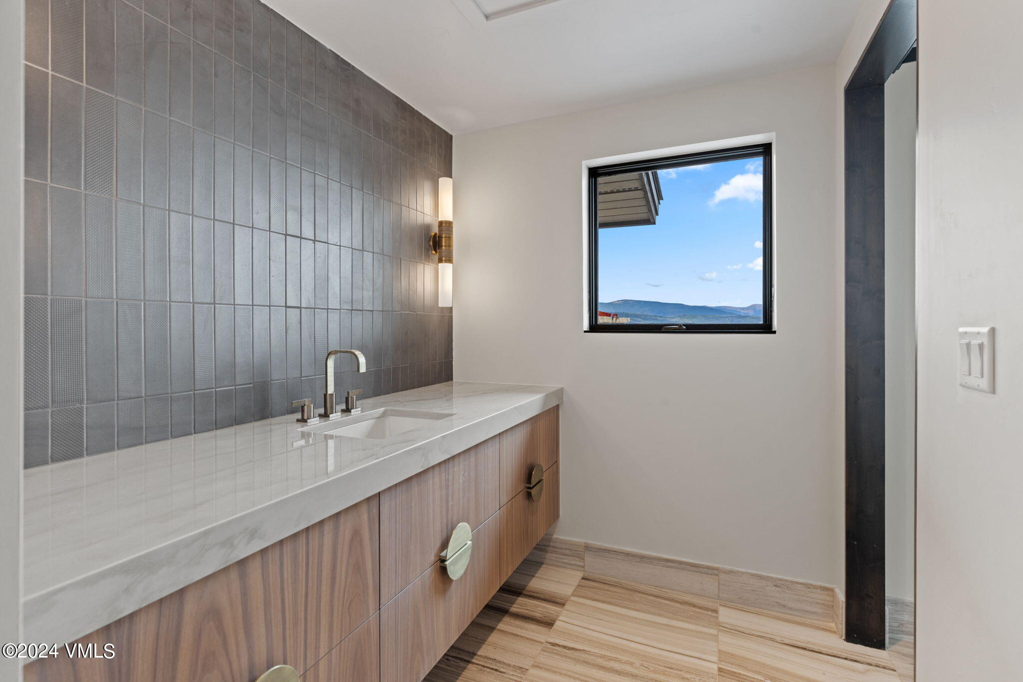 966 Webb Peak Edwards, CO 81632 - Photo 47 of 70 a bathroom with a double vanity sink and a mirror