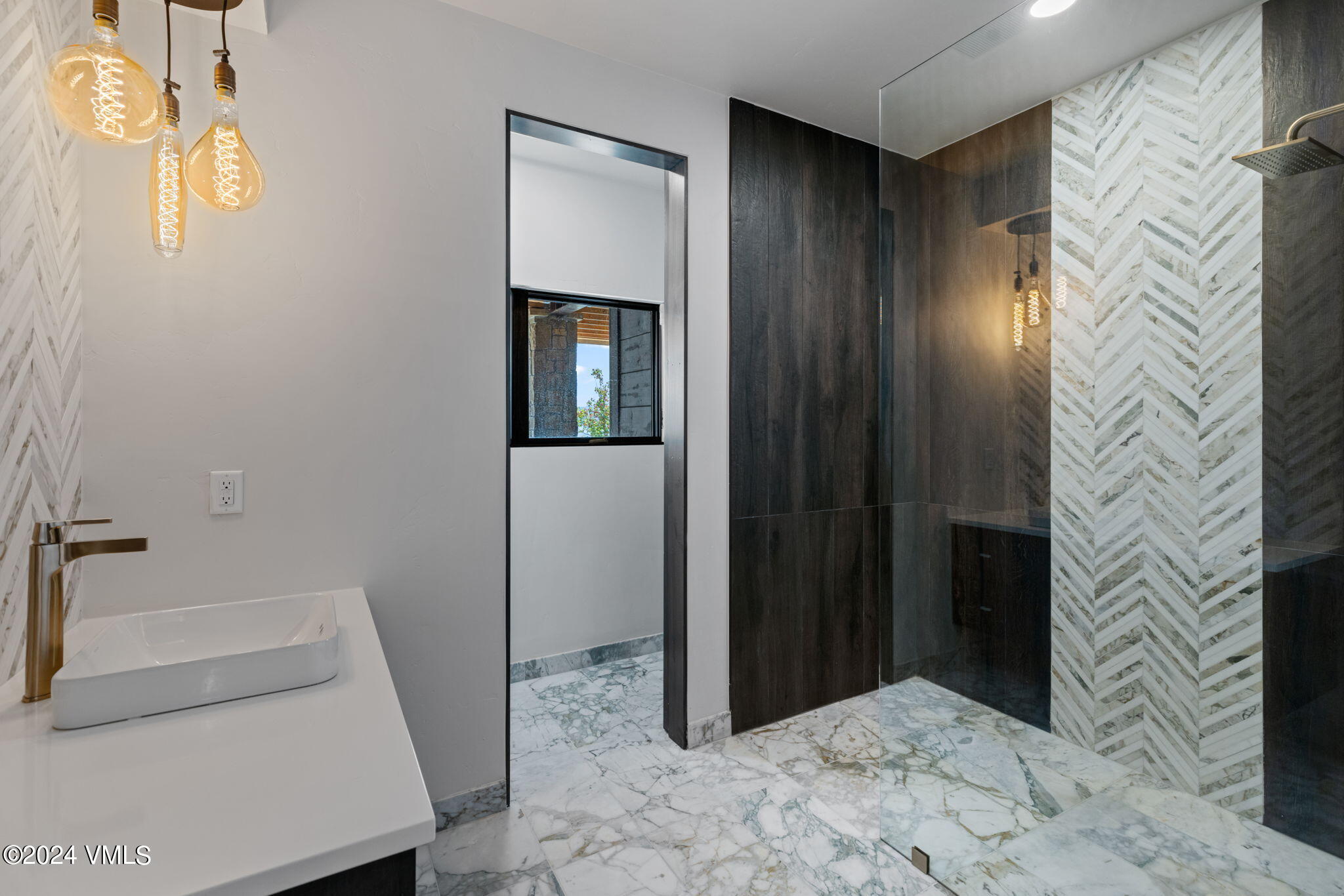 966 Webb Peak Edwards, CO 81632 - Photo 61 of 70 a bathroom with a sink and shower