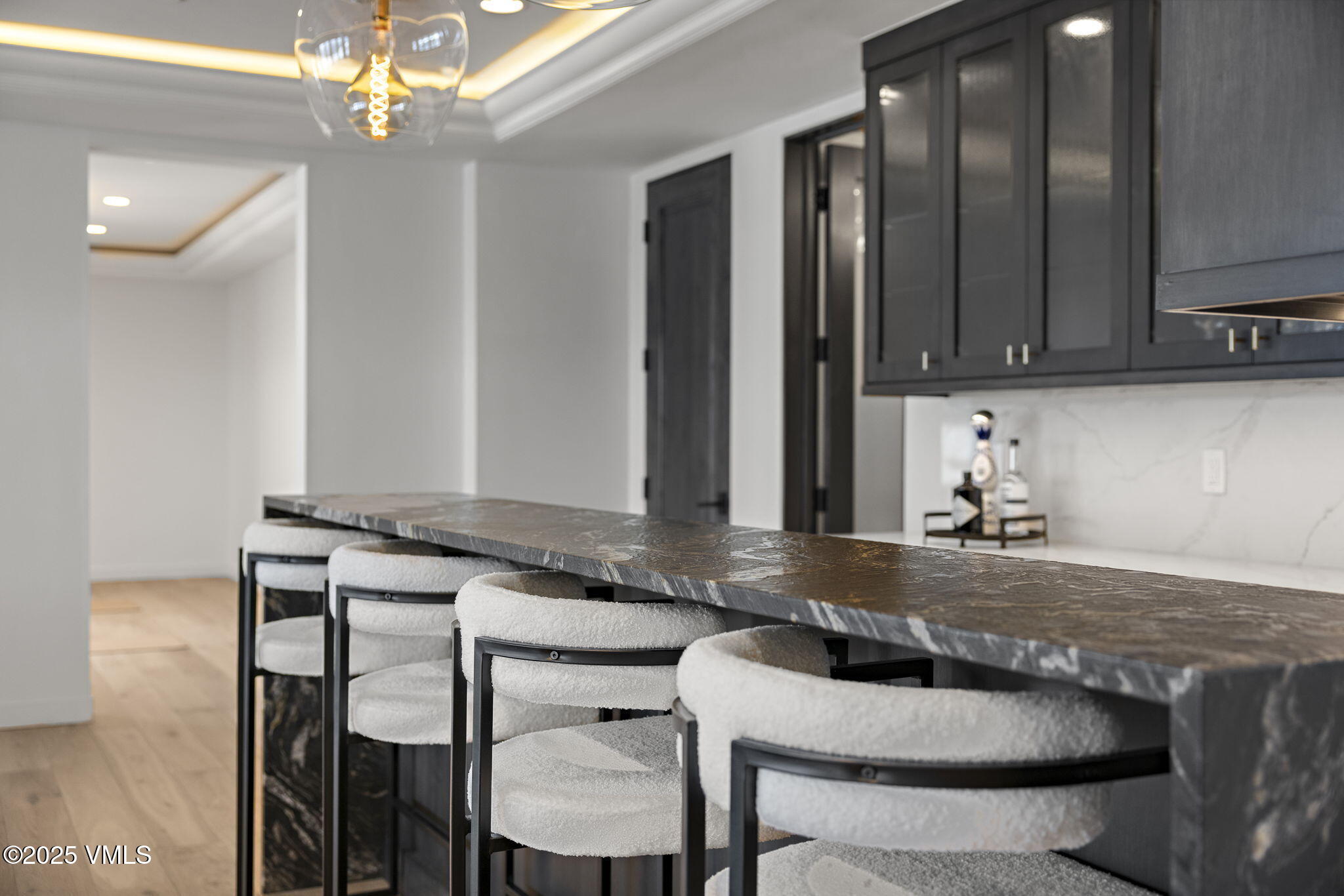 966 Webb Peak Edwards, CO 81632 - Photo 64 of 70 a kitchen with table chairs cabinets and stainless steel appliances