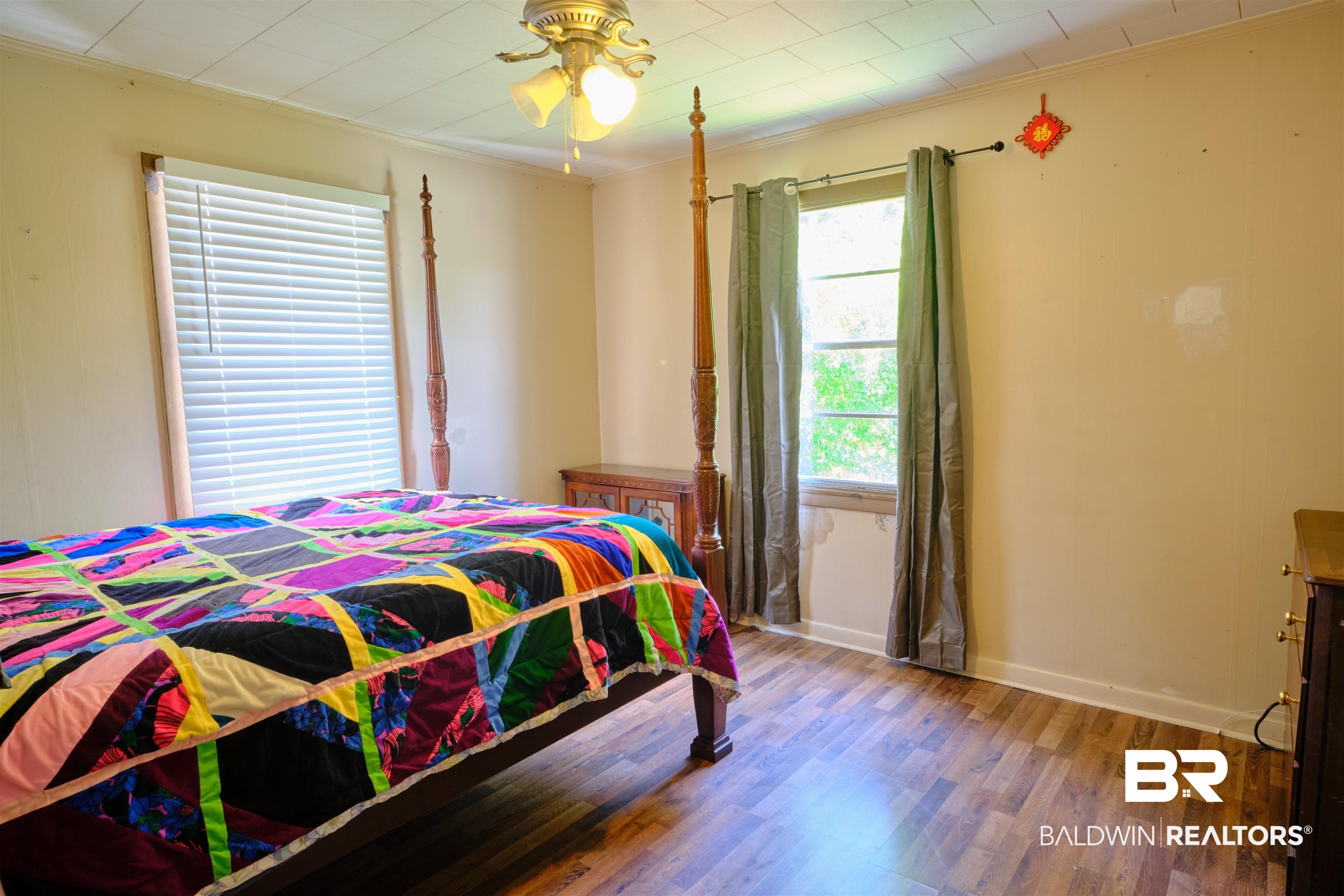 101 West Horner Street Atmore, AL 36502 - Photo 3 of 38 Bedroom featuring ceiling fan, hardwood / wood-style flooring, and ornamental molding