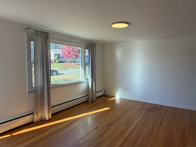a kitchen with stainless steel appliances a refrigerator stove and microwave