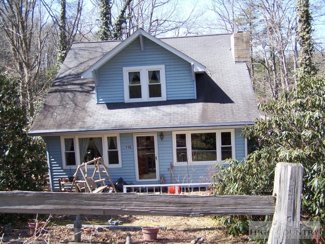 110 Overlook Drive Boone, NC 28607 - Photo 1 of 1 a front view of house with yard and seating area
