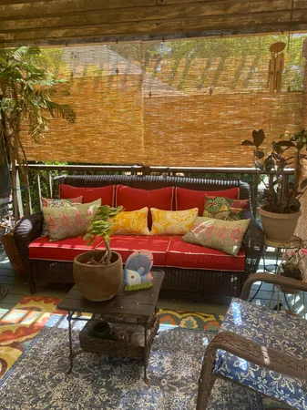 a view of swimming pool with outdoor seating