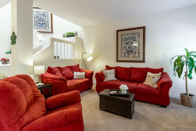 a living room with furniture and a couch