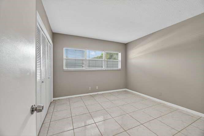 1200 Southwest 12th Court, Unit 203 Fort Lauderdale, FL 33315 - Photo 14 of 23 a view of an empty room with a window
