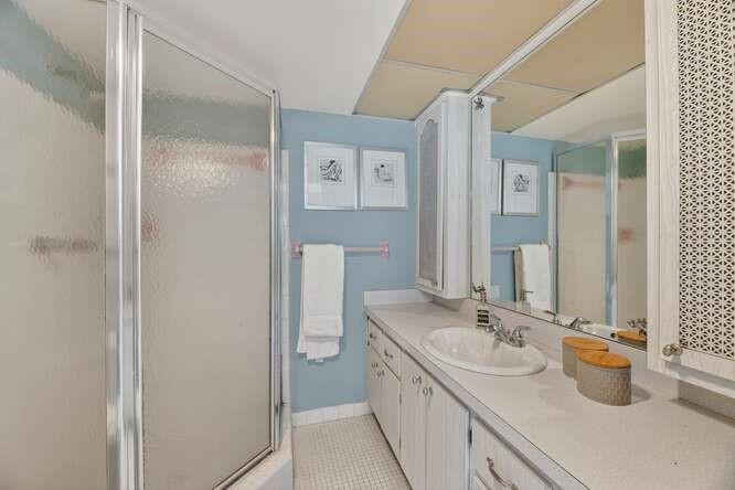1200 Southwest 12th Court, Unit 203 Fort Lauderdale, FL 33315 - Photo 16 of 23 a bathroom with a sink and a mirror