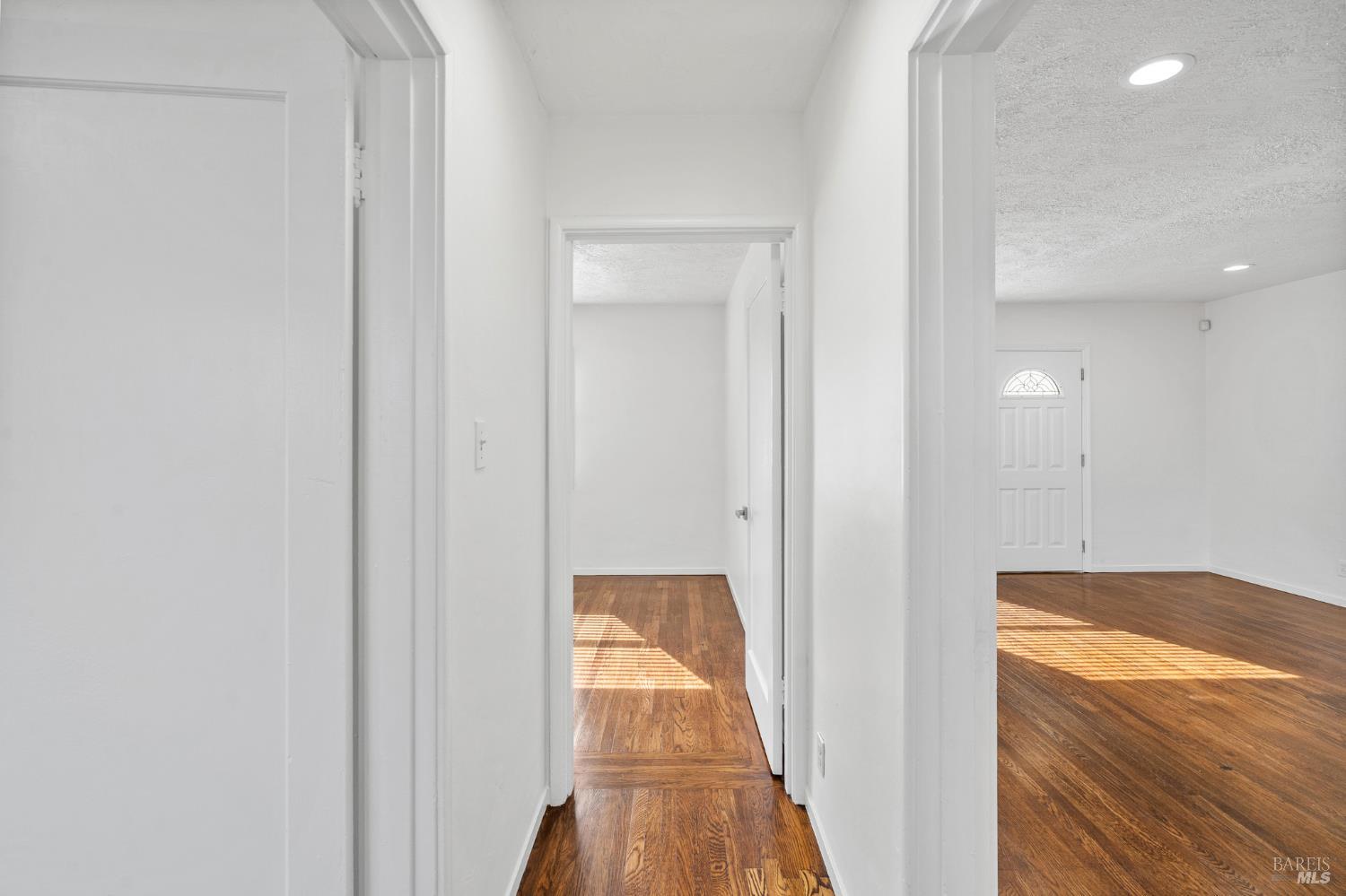 458 Spring Street Richmond, CA 94804 - Photo 19 of 26 a view of a hallway with a hallway