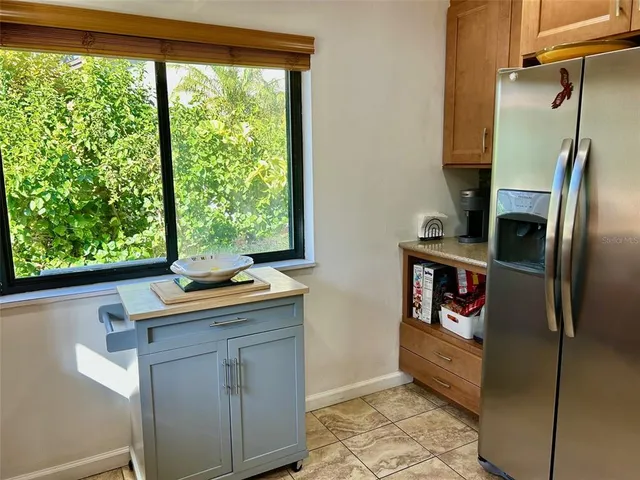 a kitchen with a sink and washing machine